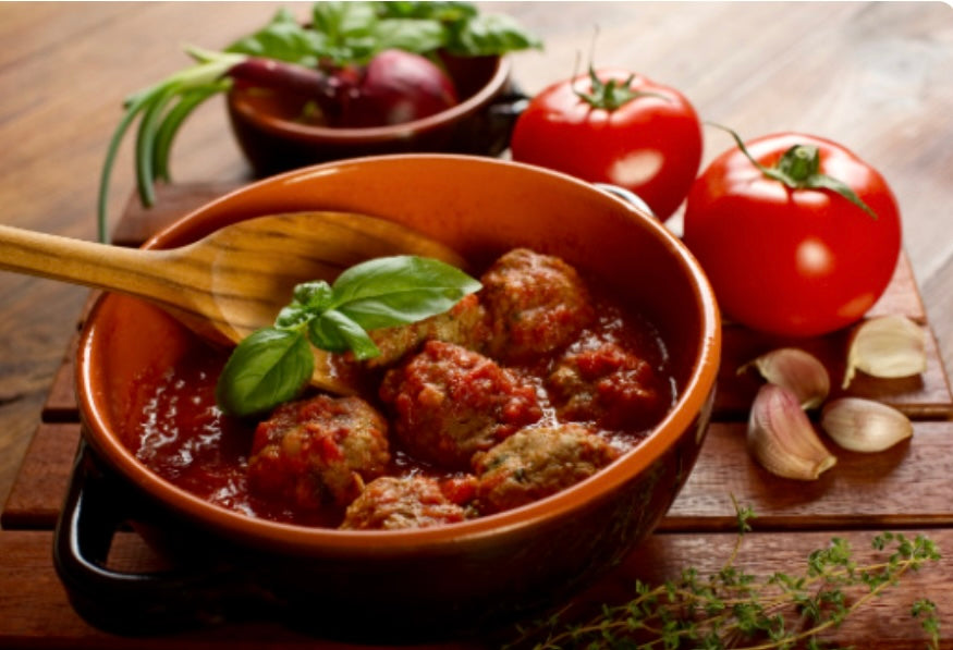 Beef & Pork meatballs in a Tomato Sauce with Must Chup