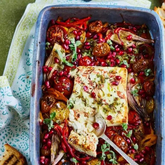 BAKED FETA WITH SLOW ROASTED TOMATOES, PEPPERS AND POMEGRANATE MOLASSES